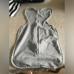 Love to dream swaddle sack used with 1 baby.  Size Medium 13-19 pds